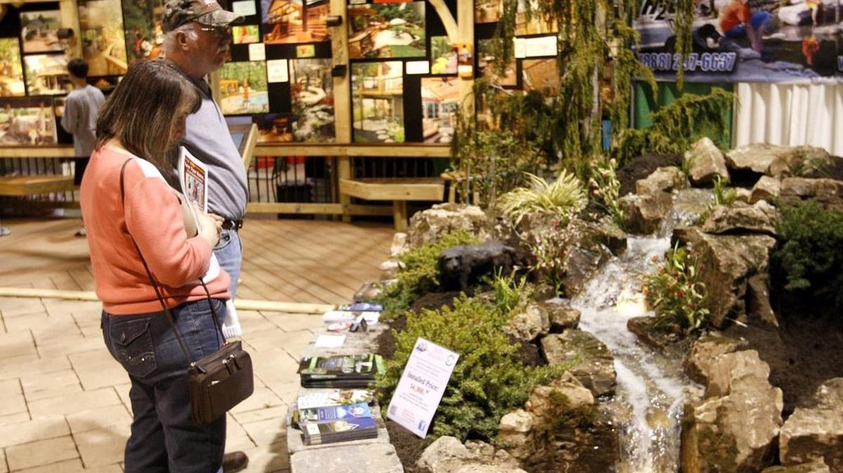 Anita and Randall Brandenburg of Beattyville check out a water installation during the 2013 Central Kentucky Home and Garden Show at the Lexington Center. This year’s event starts Friday.