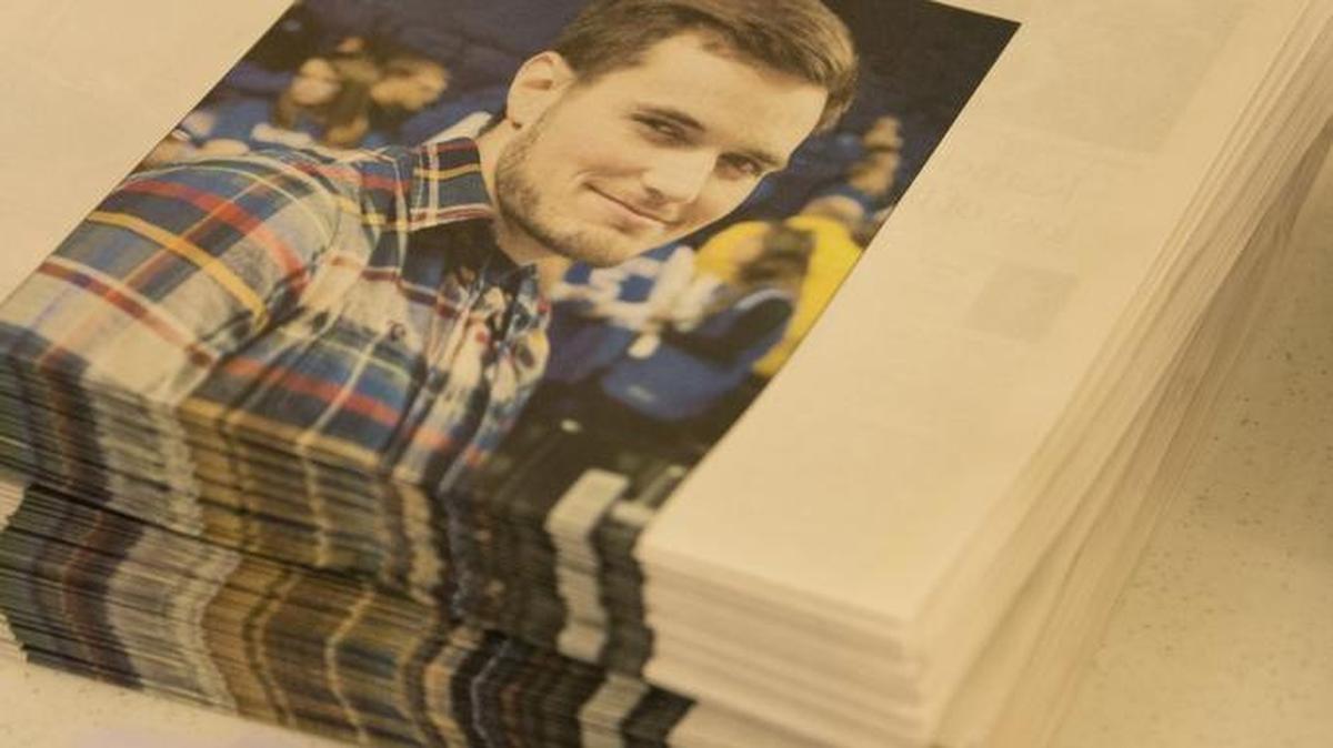 Special editions of the Kentucky Kernel were printed for a memorial and candlelight vigil for Jonathan Krueger at Memorial Hall on April 20, 2015.