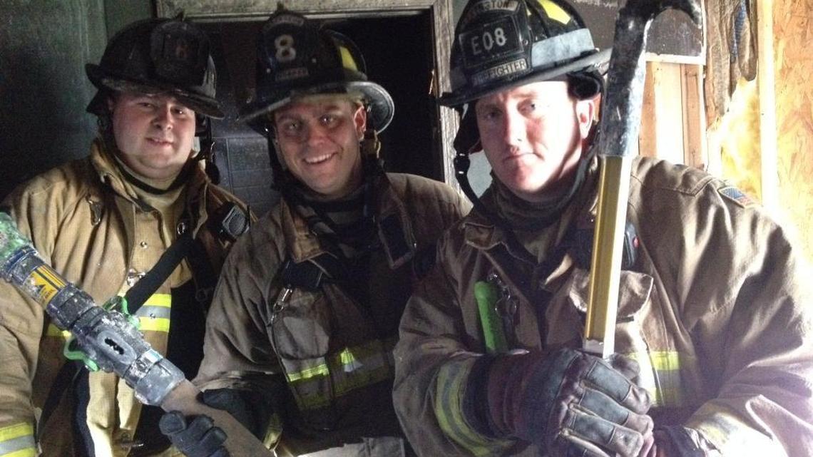 Lexington firefighter Matt Logsdon, right, has died after battling cancer. The firefighter had no symptoms before his diagnosis in January.