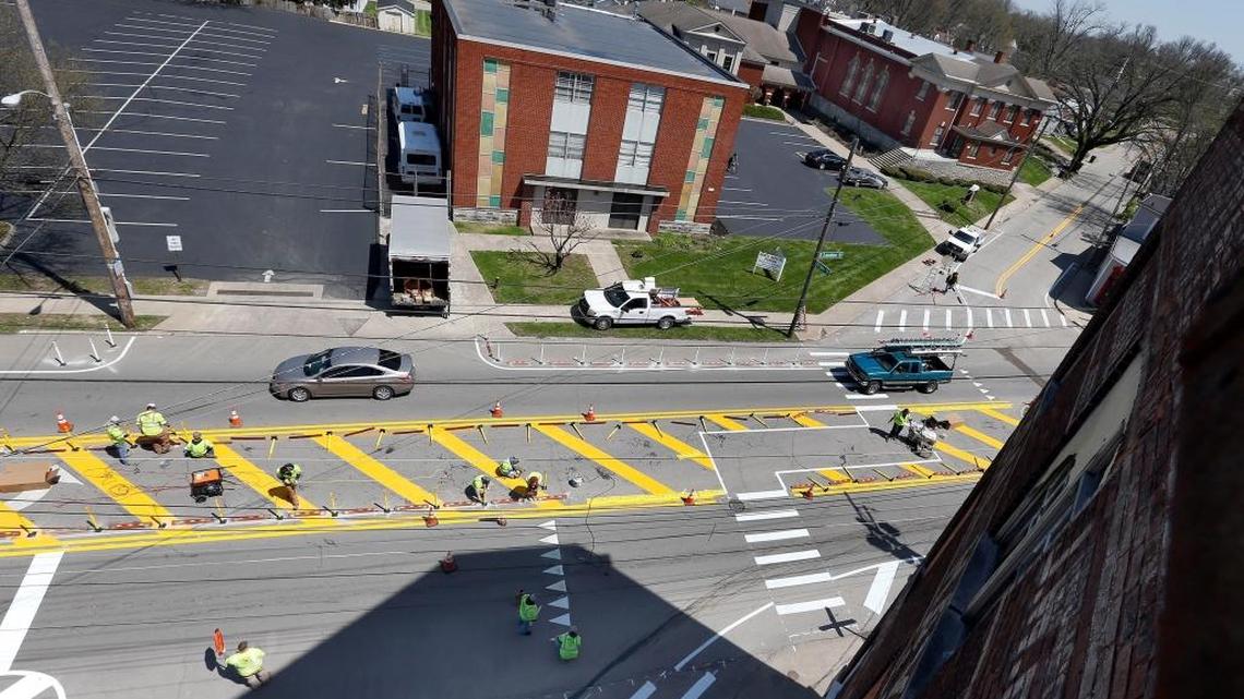 Workers installed barriers to prevent turns as the redesign of the intersection of Loudon Avenue and Bryan Avenue continued Tuesday afternoon. The city of Lexington is doing a demonstration project at the intersection that will limit turning in some instances to help make the intersection safer for motorists and pedestrians alike. The temporary changes will be in effect until this summer. The city will monitor the changes to see if the intersection becomes safer.