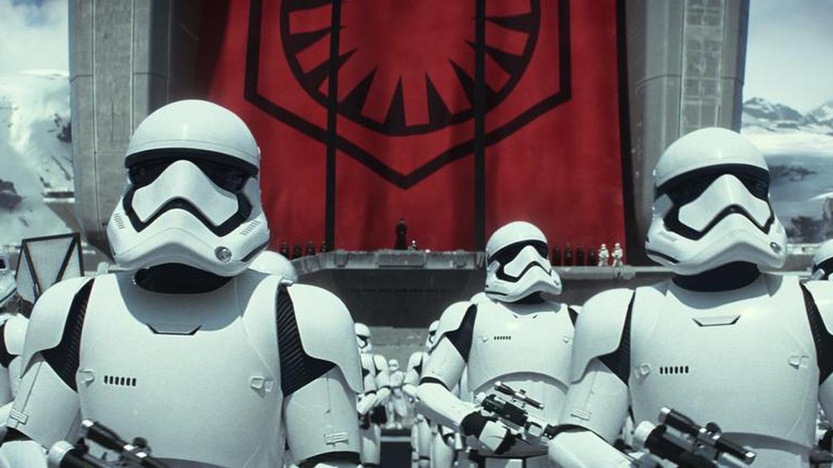 Stormtroopers are on guard in a scene from the new film Star Wars: The Force Awakens.