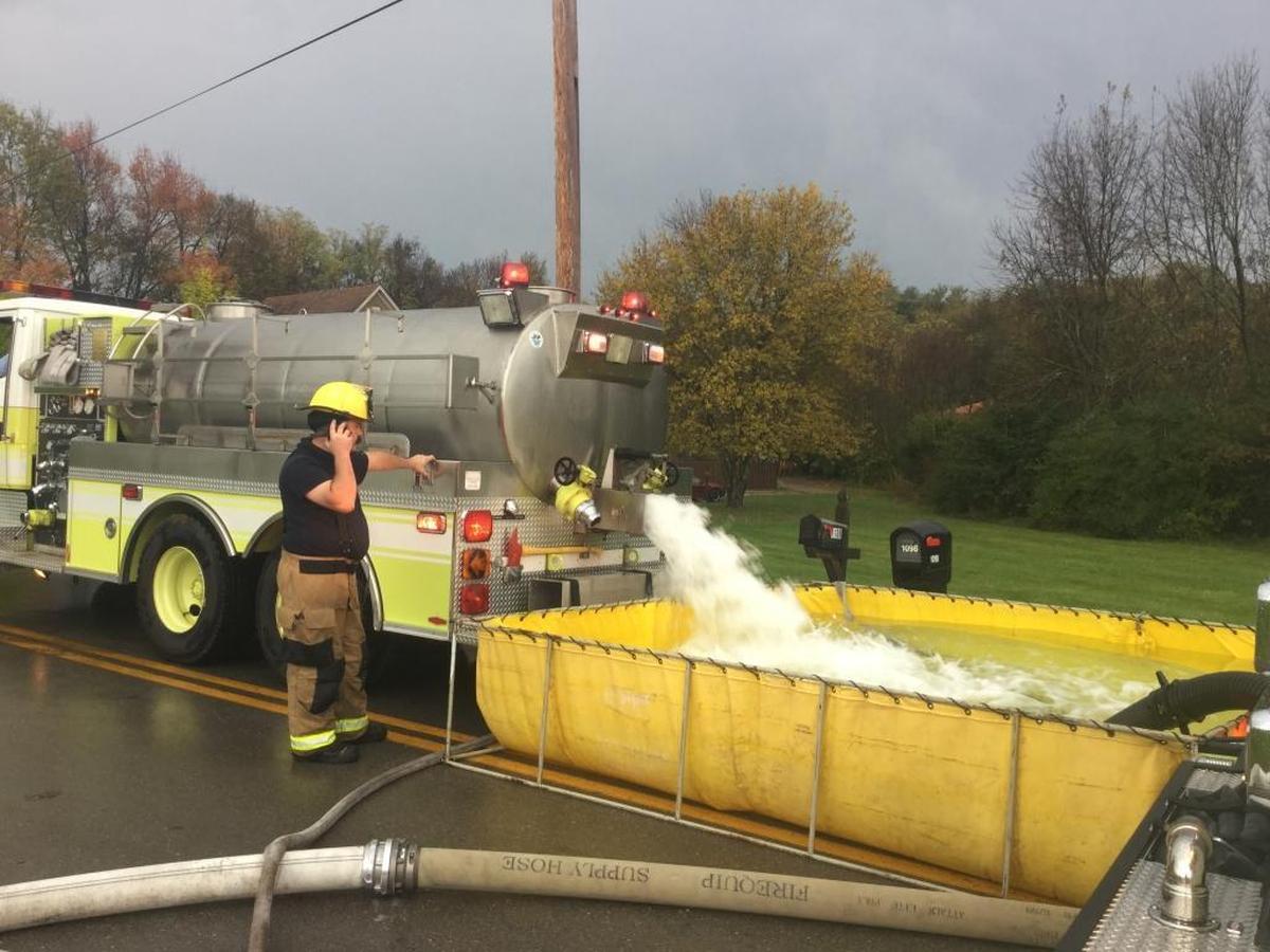 Firefighters had to truck in water to fight the large fire off Nicholasville near Brannon Crossing where a large house burned.