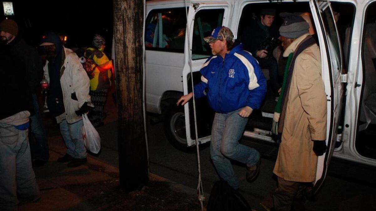 People stepped off the Compassionate Caravan at the Community Inn in Lexington in 2016. Because of cold weather, the city has activated its emergency plan to expand shelter availability and provide free rides to shelters.