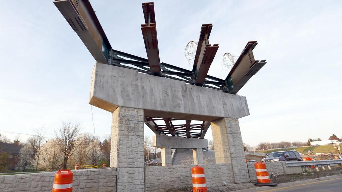 The flyover ramp bridge is ready for additional steel girders as construction continued on the new flyover ramp at Versailles Rd. and New Circle in Lexington on Wednesday. The current “loop around” ramp that takes traffic from inbound Versailles Road to northbound New Circle is being replaced with this new “flyover” ramp similar to an overpass.