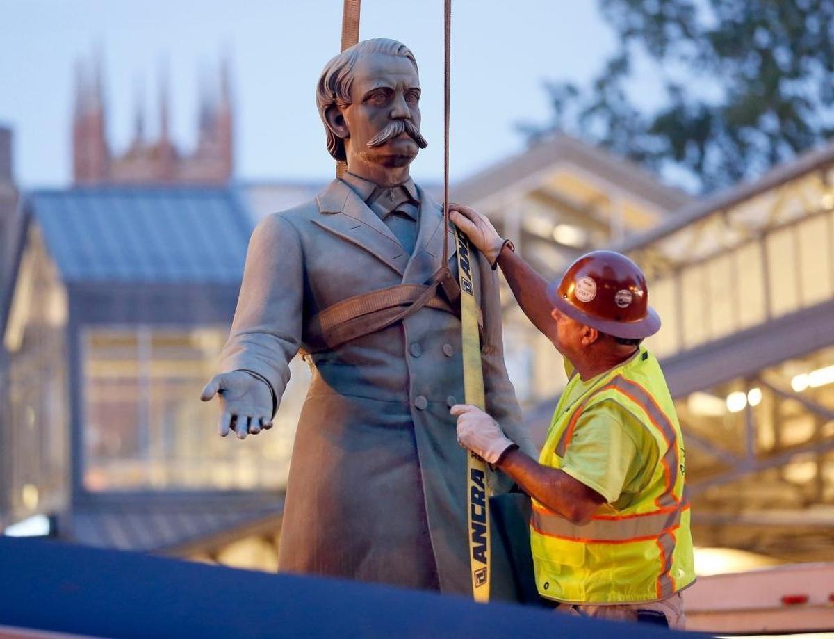 The John C. Breckinridge statue was removed from the lawn of the old Fayette County courthouse on West Main St. in Lexington, Ky., Tuesday, October 17, 2017. The statue of Breckinridge and John Hunt Morgan on his horse were moved to a private storage facility until the city finalizes details of an agreement with the Lexington Cemetery.
