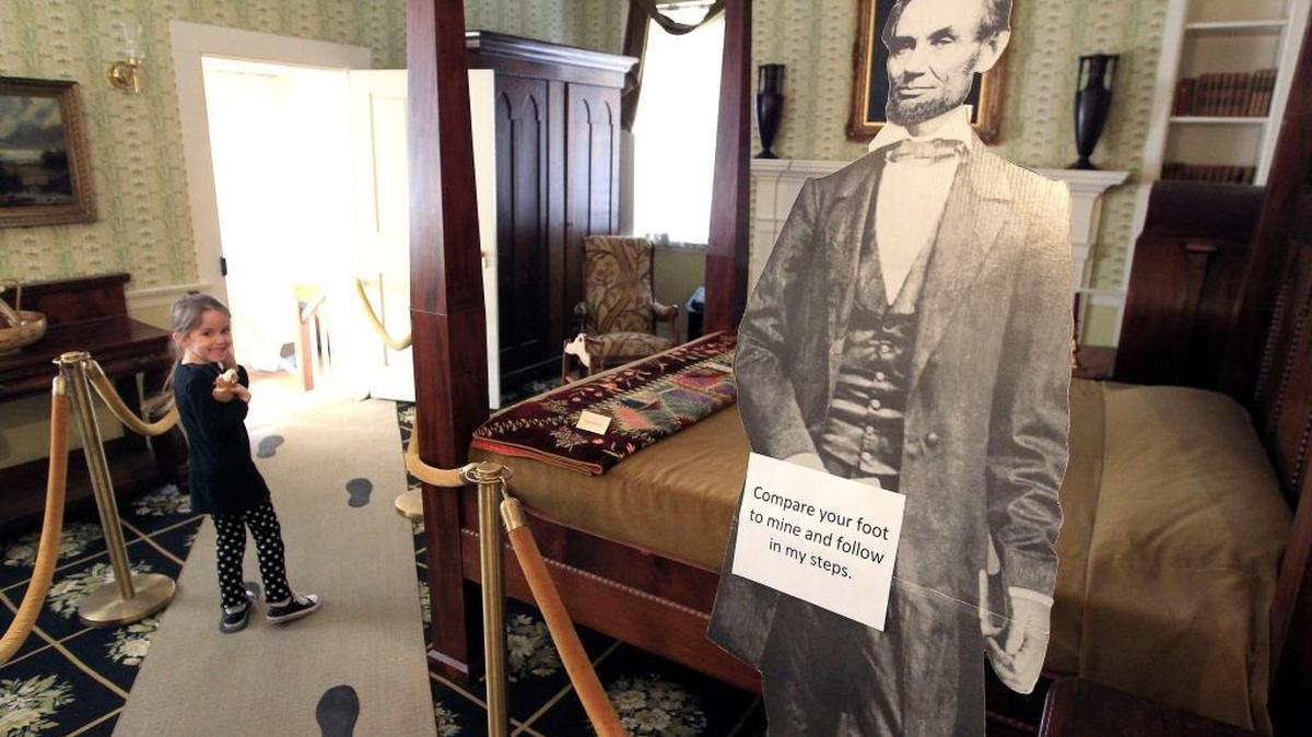 Five-year-old Savannah Belcher walked in Abraham Lincoln’s “footprints” as part of a Presidents’ Day celebration Feb. 18, 2013 at the Mary Todd Lincoln house, 578 W. Main St. in Lexington. This year’s activities will focus on the role of the first lady.