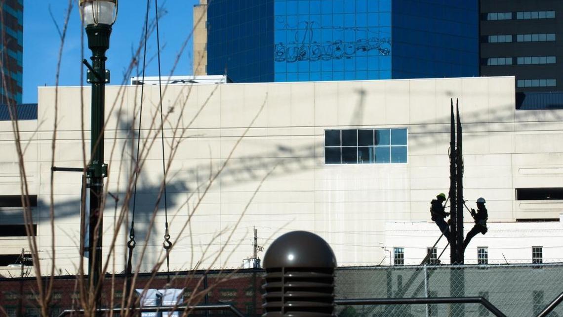 Construction workers at the CentrePointe site in downtown Lexington on Friday,Nov. 17, 2017, secure rebar for the building’s shear walls, which prepare the way for the building’s steel frame. Construction officials said they plan to begin the major steel work in mid-December, which will run through May 2018.