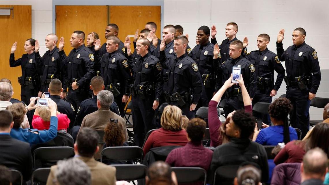 Eighteen new graduates of the Lexington Police Department were ceremonially sworn in Thursday by Public Safety Commissioner Ronnie Bastin during a ceremony at the Lexington Police Training Academy. Mayor Jim Gray had officially sworn in the officers a few days ago because he had to be out of town on Thursday. Speakers at the graduation ceremony included Public Safety Commissioner Ronnie Bastin, Police Chief Mark Barnard and the Rev. Dr. C.B. Akins Sr. from First Baptist Church Bracktown. The police training academy is on the Bluegrass Community and Technical College’s Newtown Campus, 500 Newtown Pike.