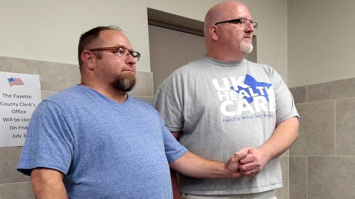 Robert Wardlow, left, and Michael Todd after they received their marriage license in the Fayette County Clerk’s office on June 26, 2015. They were married the next day at the Lexington Pride Festival.