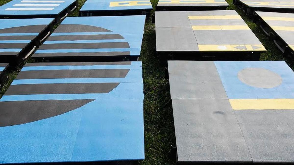 Pads to be used in the SplashJam water feature in Northeastern Park awaited installation Friday.