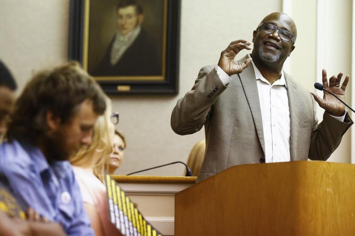 The Rev. Anthony Everett of Wesley United Methodist Church speaks to the crowd and members of the Lexington-Fayette Urban County Council ahead of a vote on a proposal to move two Confederate-era statues from downtown Lexington at the Lexington-Fayette Urban County Government Center in Lexington, Tuesday, Aug. 15, 2017. The council voted 15-0 to pass the resolution.