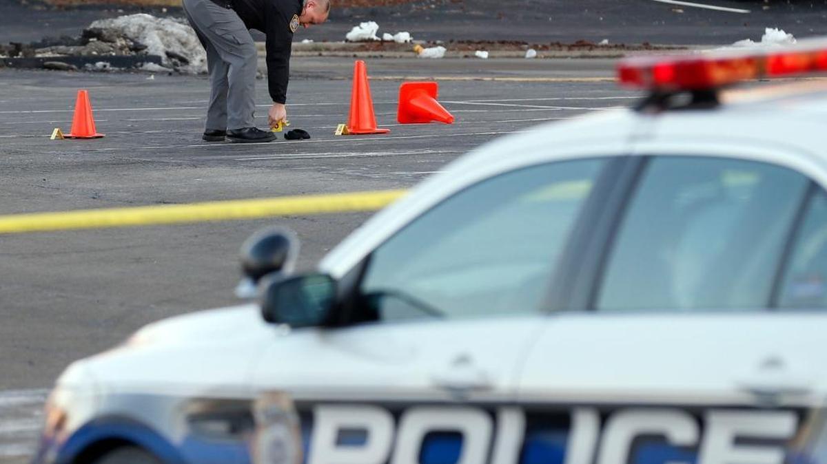 A Lexington police officer investigated Friday in a parking lot near Camelot East off Richmond Road.