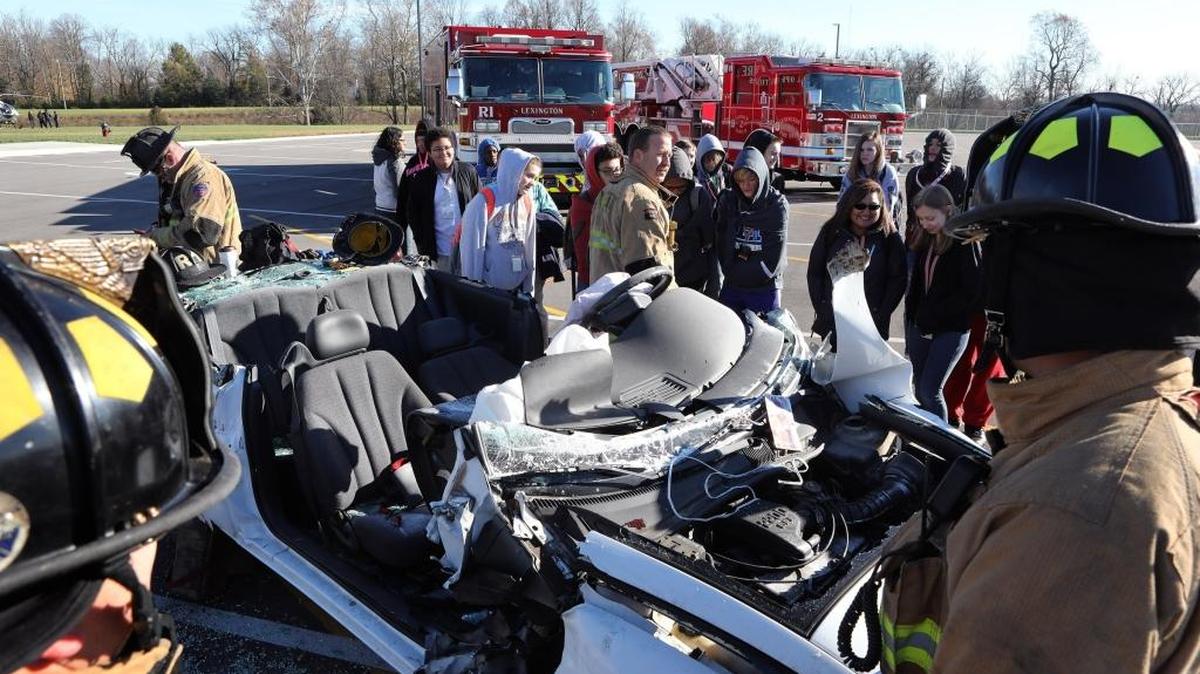 Capt. Scott Whitt led a discussion about about car extractions and safety during The Youth Citizens Academy Frederick Douglass High School.