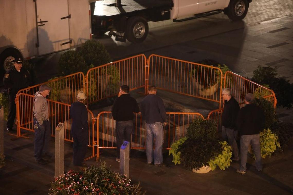 Onlookers check out the remains after crews removed the statue of Confederate Gen. John C. Breckinridge, who also served as U. S. vice president, from the old Fayette Co. Courthouse in Lexington, Ky., Tuesday, October 17, 2017.
