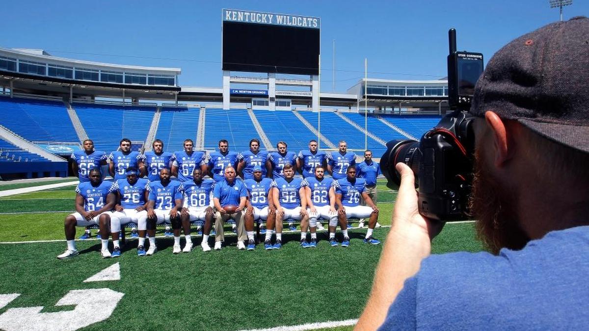 UK Athletics photographer Chet White snapped a photo of offensive line coach John Schlarman and his unit during UK football's media day earlier this year.