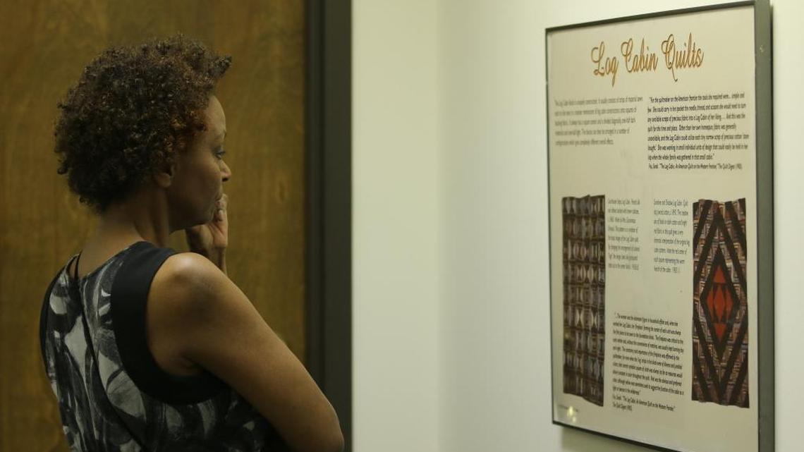 Joyce Johnson of Lexington browsed an exhibit about the history of quilts at the Lexington History Museum’s Pop-Up History Exhibit at Victorian Square on May 19, 2017. The mobile exhibit was a part of LexArt’s Gallery Hop.