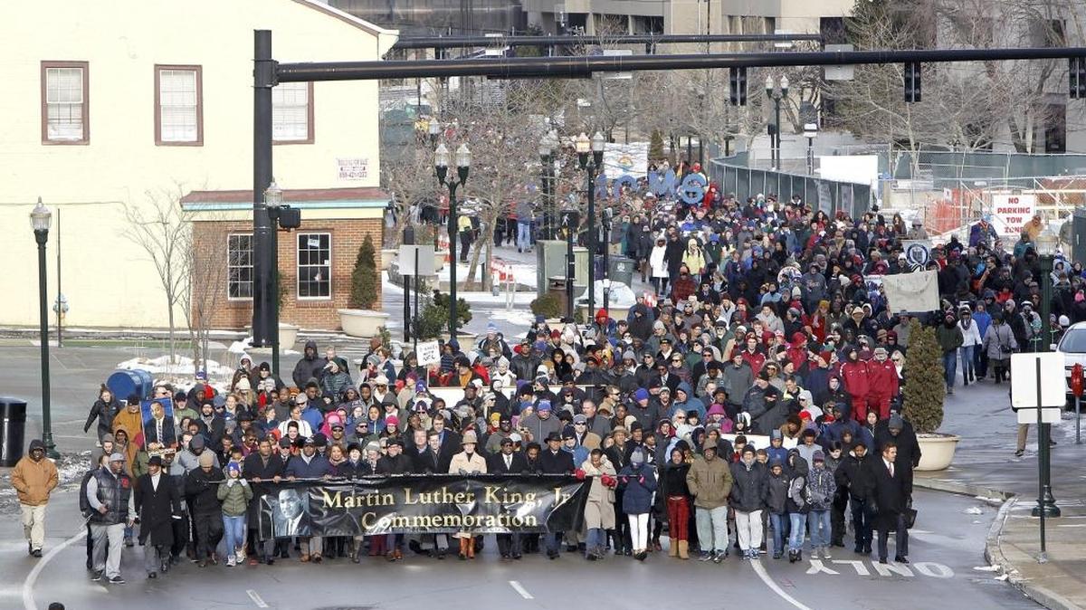 An aerial view of the Freedom March shows thousands of marchers through downtown Lexington on MLK Day
