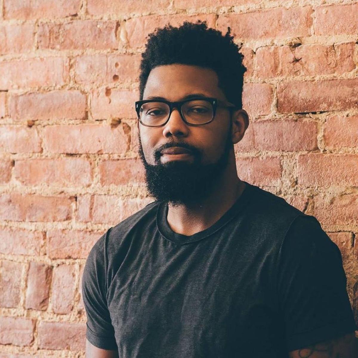 Damon Young said his hair was searched Thursday during a security screening at Blue Grass Airport.