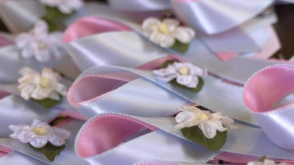 Remembrance ribbons lined the registration table before the annual Walk to Remember for National Pregnancy and Infant Loss Awareness Month at Lexington Cemetery in 2004. This year’s event will be Oct. 8.