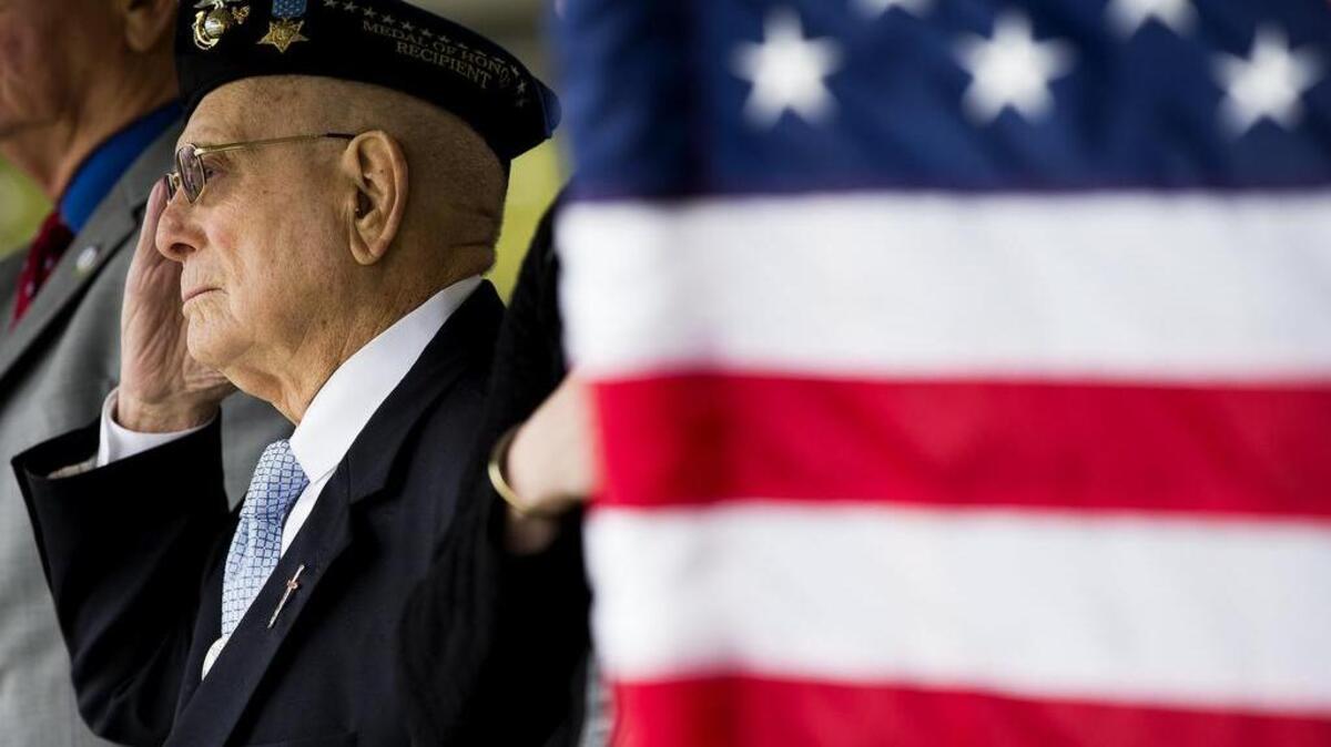Hershel “Woody” Williams of Ona, W.Va., salutes during the dedication of a Gold Star Families memorial monument in Lexington, Ky., in 2017.