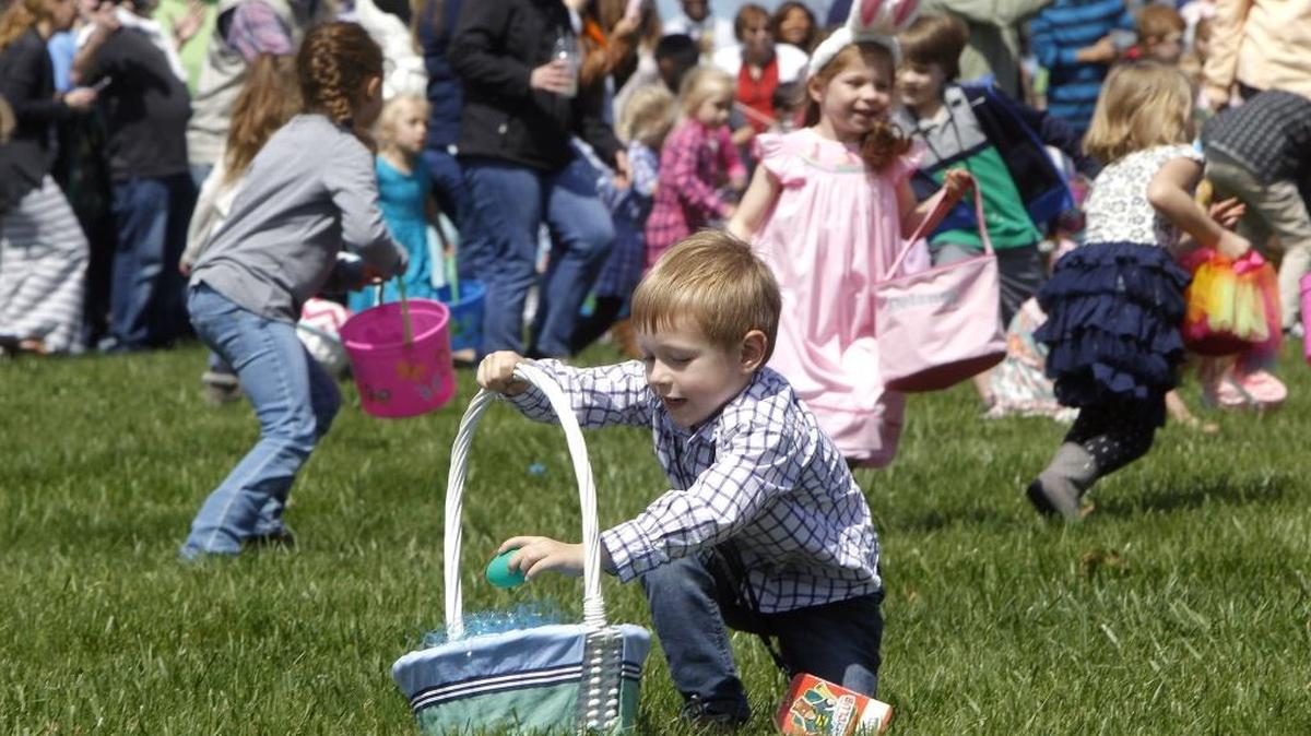 A boy collected an egg during the Keeneland Kids Club Easter Egg Hunt at the Keene Entertainment Center in Lexington, Ky., Sunday, April 2, 2017.