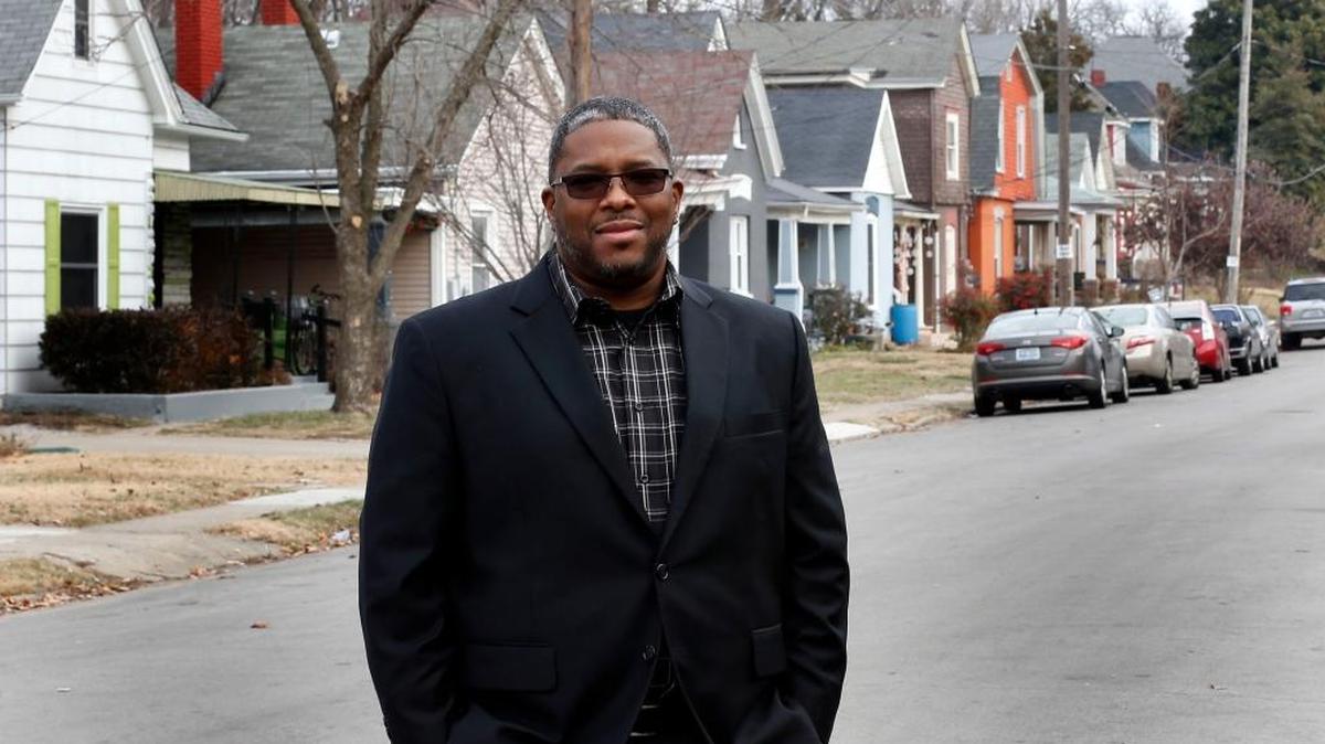 Councilman James Brown on Johnson Ave. in Lexington, Ky., Friday, December 23, 2016. Brown wants an Urban County Council committee to look at a program that would help long-term homeowners pay portions of property taxes in areas where there is an uptick in development. The areas around Martin Luther King and Fourth Street, including Johnson Avenue, have seen an influx in new development.