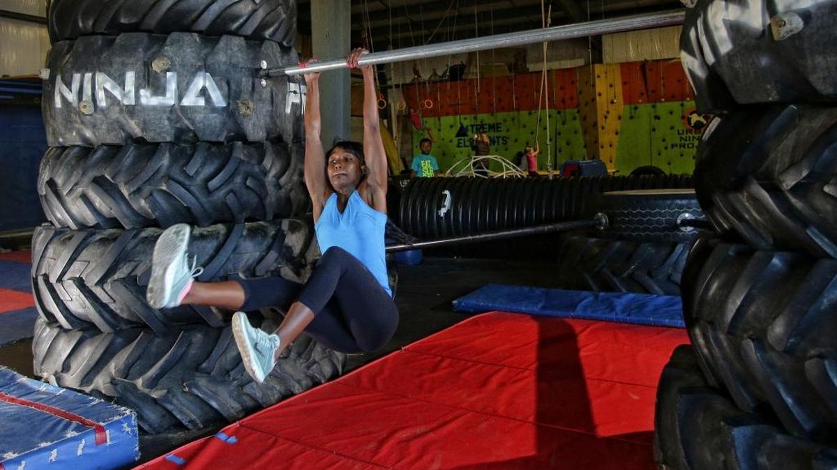 Mercedes Ramos worked her way through the obstacle course at Urban Ninja on Monday.