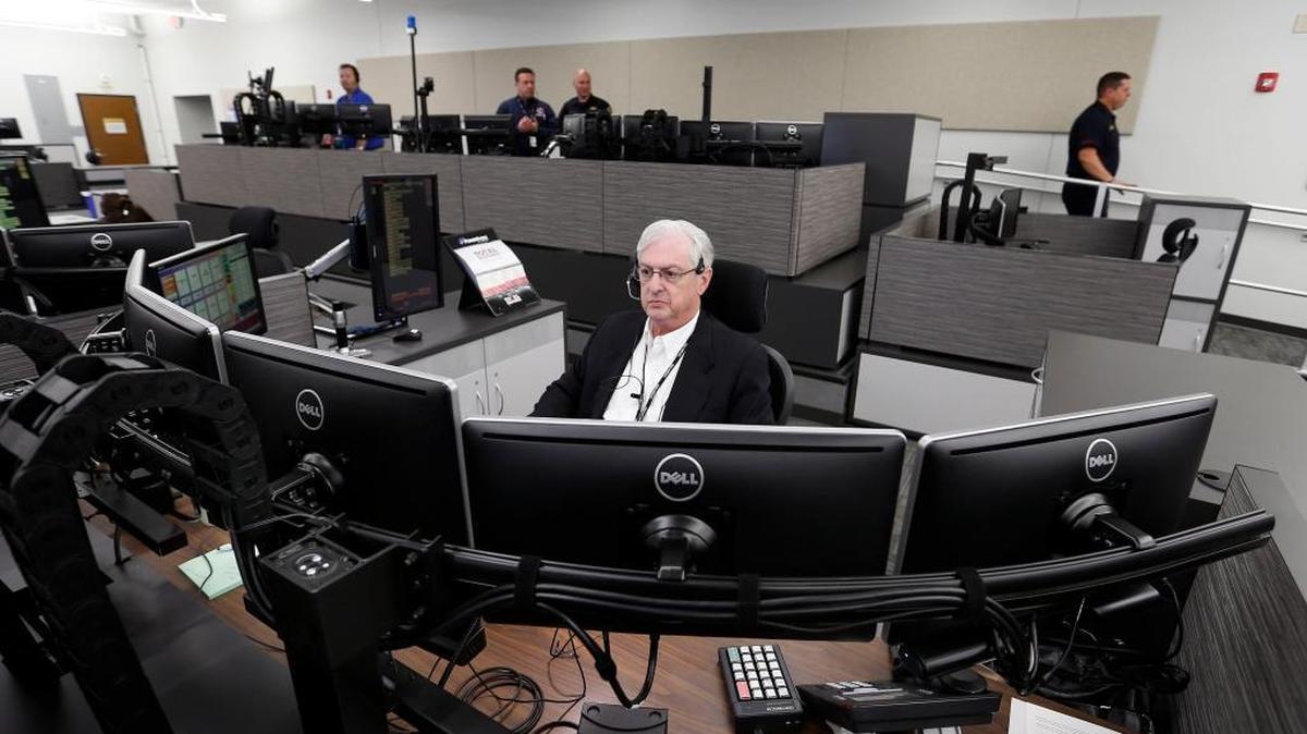 Curtis Hale, a fire dispatcher for 10 years, worked in the new E-911 center following a grand opening celebration for the city's new Public Safety Operations Center on Cisco Road in 2016.