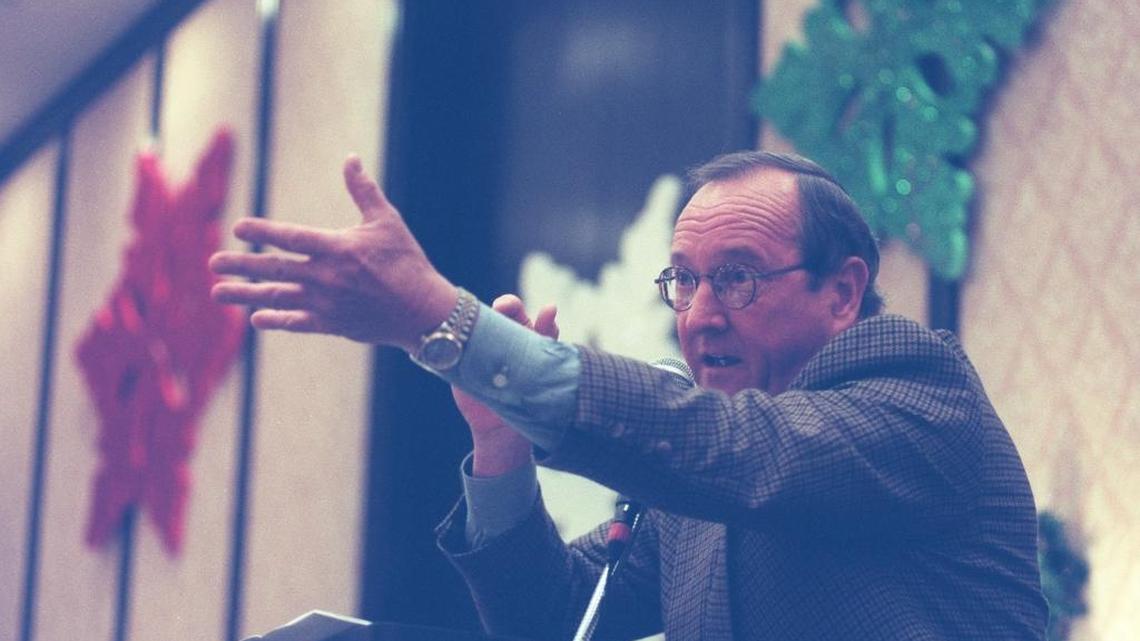 Auctioneer Jim Riley was the auctioneer at the 11th annual Gingerbread House Contest and Auction in December 1998.
