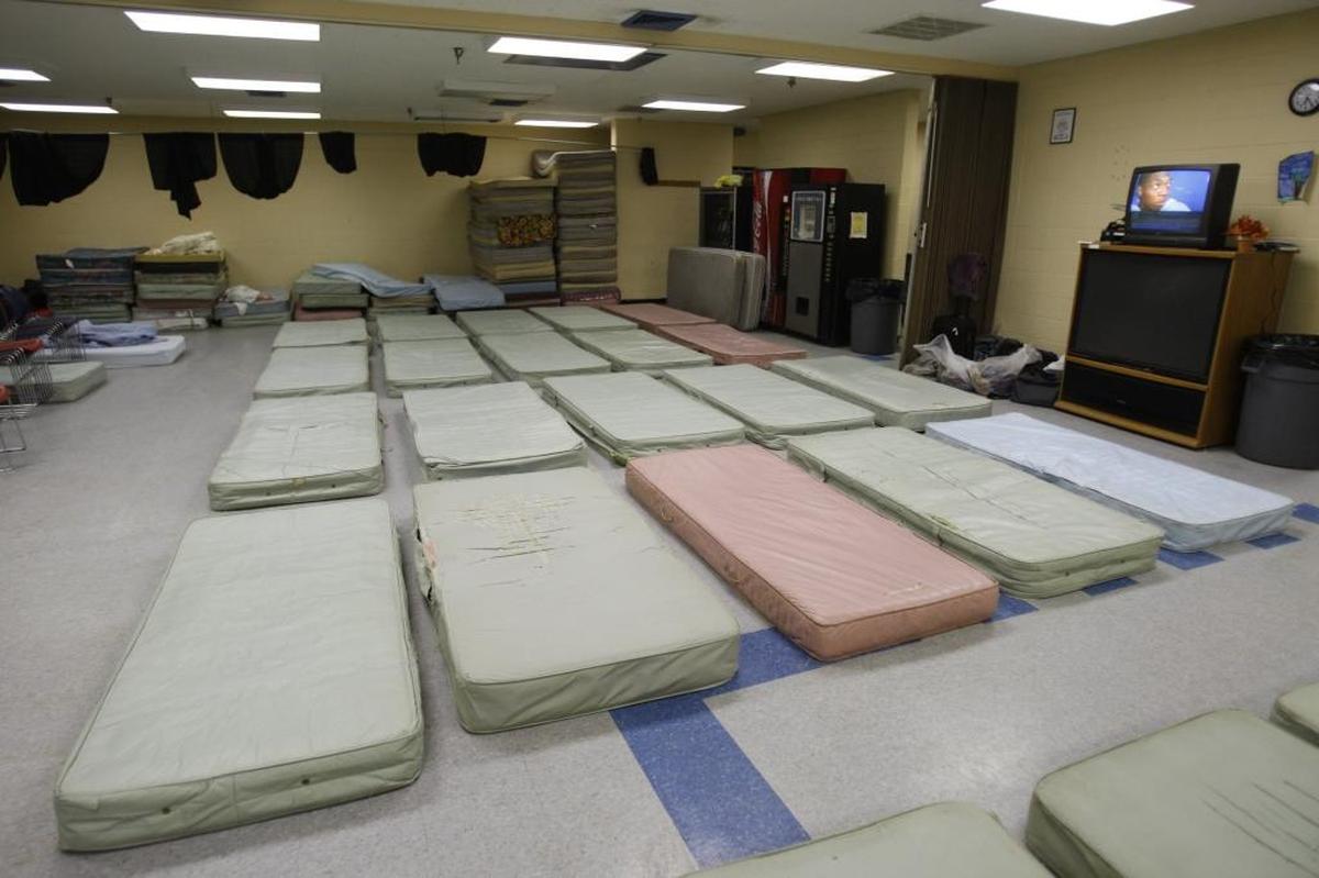 The cafeteria floor was filled with mattresses at The Hope Center on Loudon Avenue in January 2008.