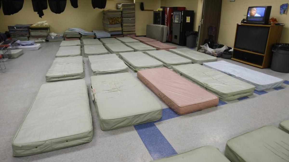 The cafeteria floor was filled with mattresses at The Hope Center on West Loudon Avenue.