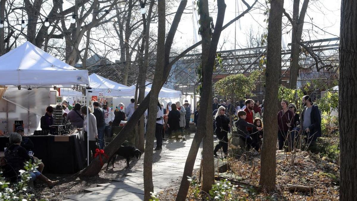 Folks shopped and mingled during a German-style Christmas Market at Kentucky Native Cafe inside Michler’s Greenhouses in 2017. This year’s version will be online.