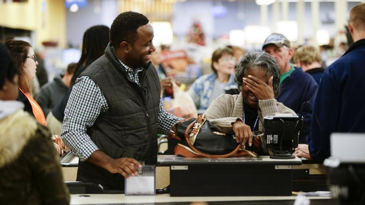 Erma Mack was shocked as LaRon Tanksley, pastor of Perfecting Praise Church, caught her in line and paid $50 toward her shopping bill at the Bryan Station Kroger on Monday evening.