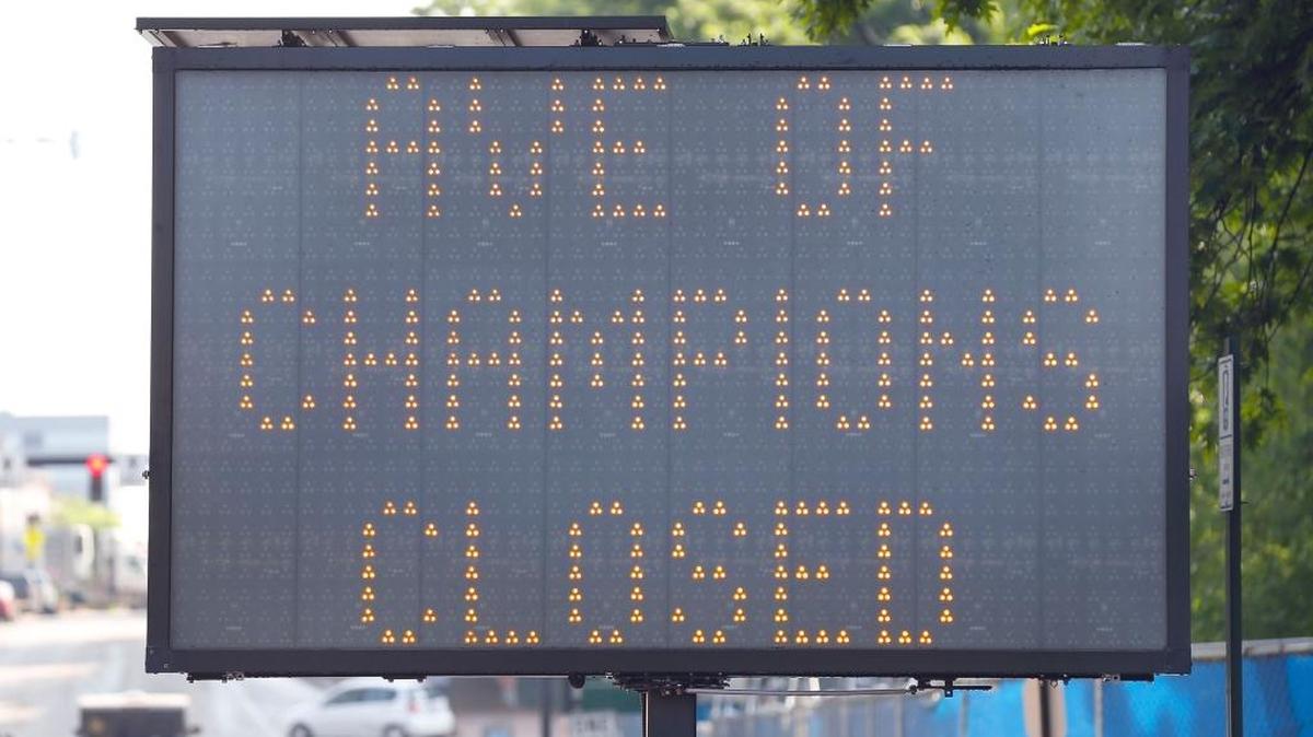 Signs warning of an upcoming temporary closure of Avenue of Champions were in place in Lexington.