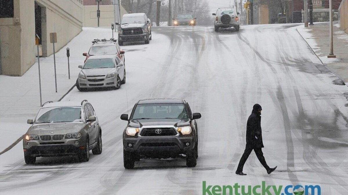 Lexington streets were coated within about an hour of snow starting to fall Thursday.