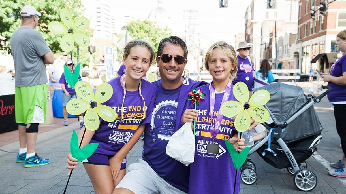 Michael Woodworth, center, was the top individual fundraiser at the Aug. 27 Walk to End Alzheimer’s at the Kentucky Horse Park. He raised $2,990. He is pictured with his children, Lucy, left, and William.