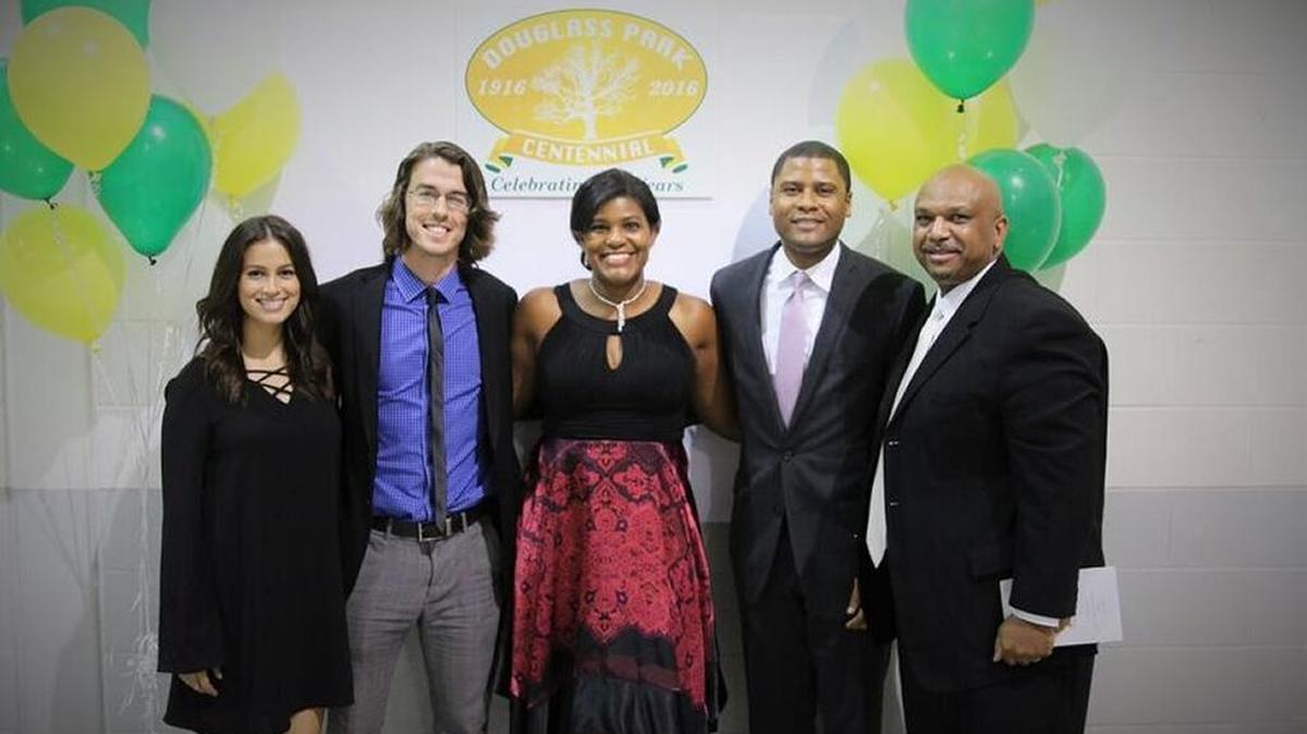 From left, Alyssa McKenzie; Josh Nadzam, Leadership Lexington 100 Hands volunteer; Melissa Murphy, Douglass Park Centennial Commission member; Christian Motley, Leadership Lexington 100 Hands volunteer; and Danny Murphy attended a banquet to mark the end of the year-long Douglass Park 100th anniversary celebration.