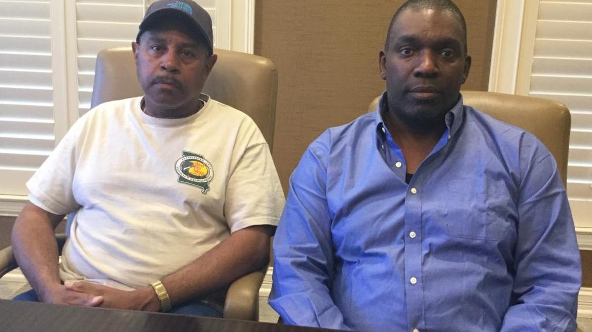 Donald Ragland, 63, left, and William Barber, 54, are two of the eight plaintiffs who were awarded $5.3 million by a Fayette Circuit Court jury in a suit against UPS.