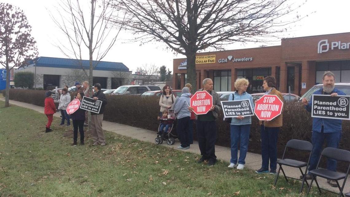 Protesters gathered at a Defund Planned Parenthood rally in front of the organization’s office on Southland Drive in Lexington Saturday.