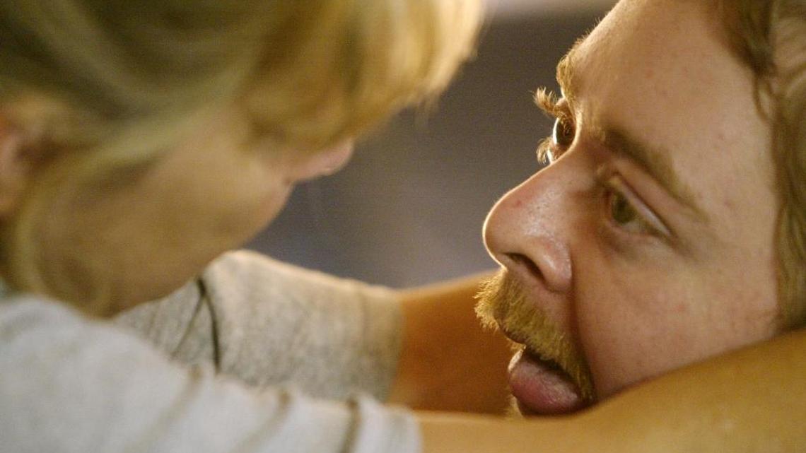 Tina Portwood talked to her son Mark between therapy sessions at their home in Lexington, Ky., on Friday, September 16, 2005.