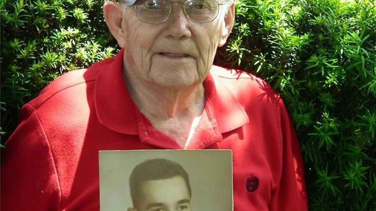Coleman Shannon held a photo of himself that was taken while he was serving in World War II.
