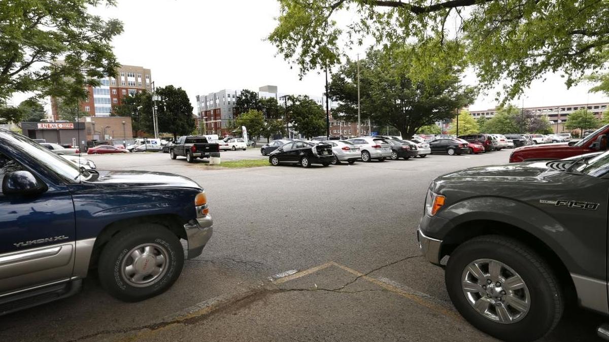 Parking lot on Jersey St. looking towards the University of Kentucky campus in Lexington, Ky., Friday, June 16, 2017.