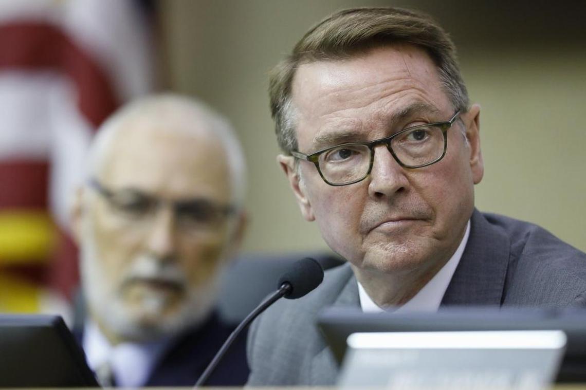 Lexington Mayor Jim Gray listens ahead of a vote on a proposal to move two Confederate-era statues from downtown Lexington in council chambers at the Lexington-Fayette Urban County Government Center in Lexington, Ky., Tuesday, Aug. 15, 2017. The council voted 15-0 to pass the resolution.