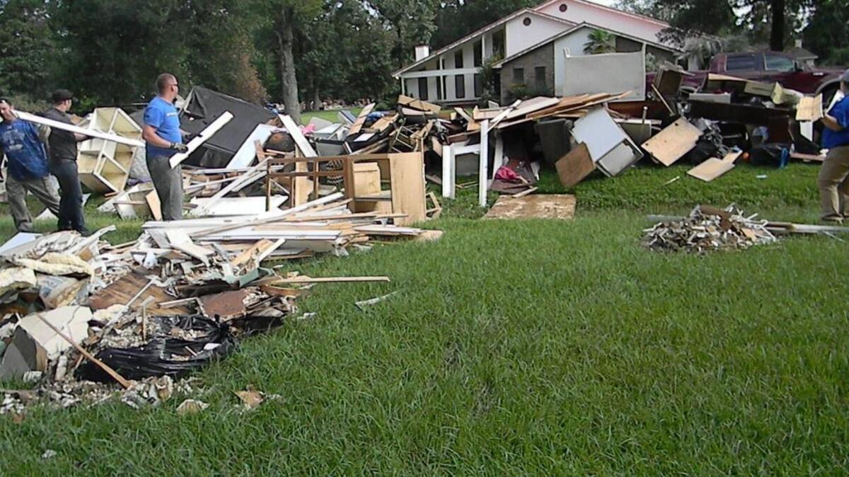 Ten volunteers from Lexington spent three days in southern Lousiana helping first responders clear their homes.