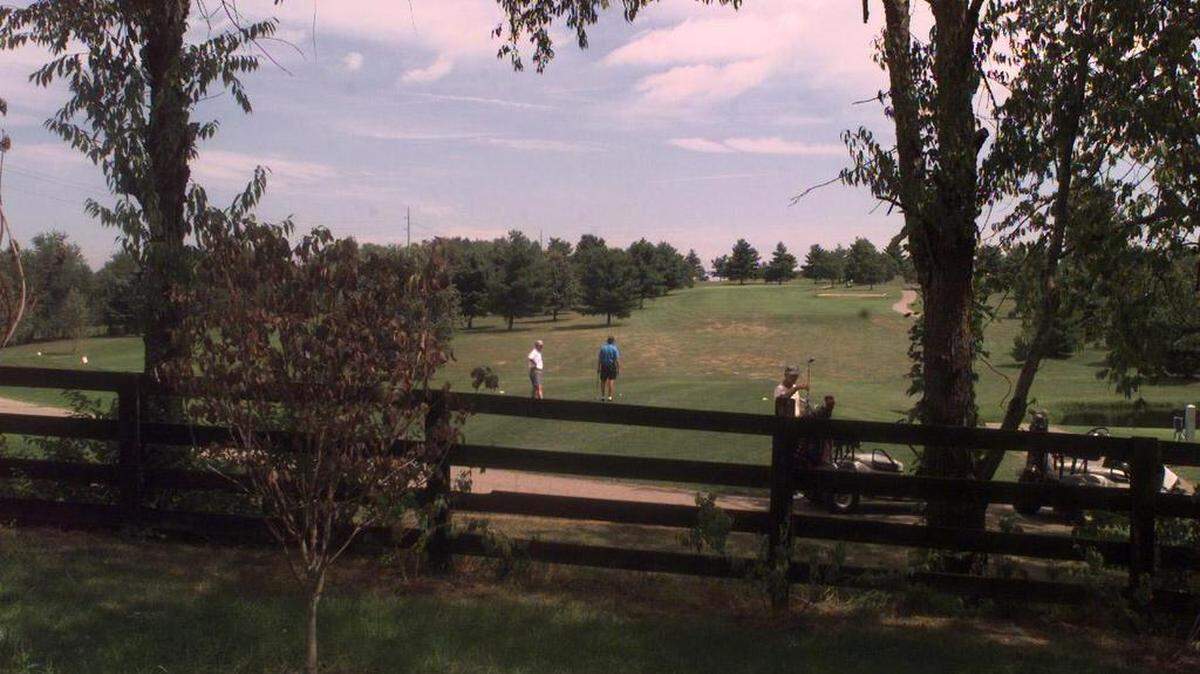Golfers at Lakeside Golf course are shown on the 17th tee on Friday Aug. 29, 1997 in Lexington Ky.