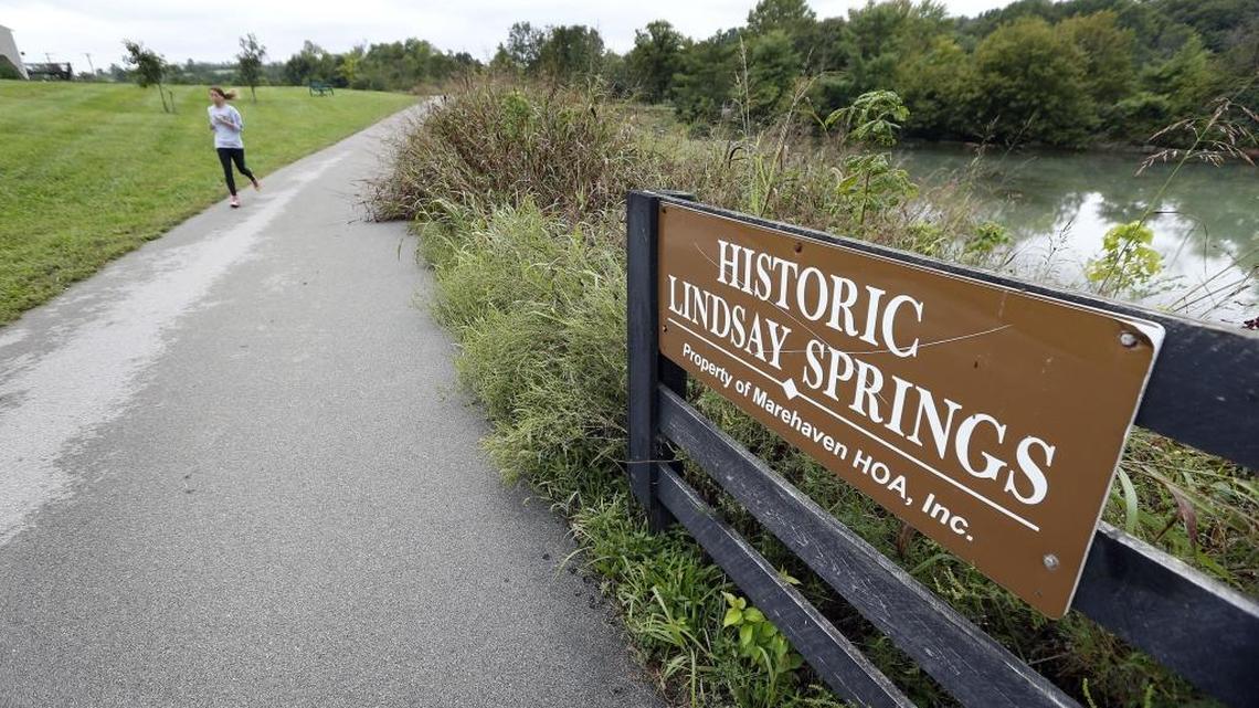 Bailey Caldwell jogged on a segment of the Town Branch Trail behind the Marehaven Subdivision in September 2014.