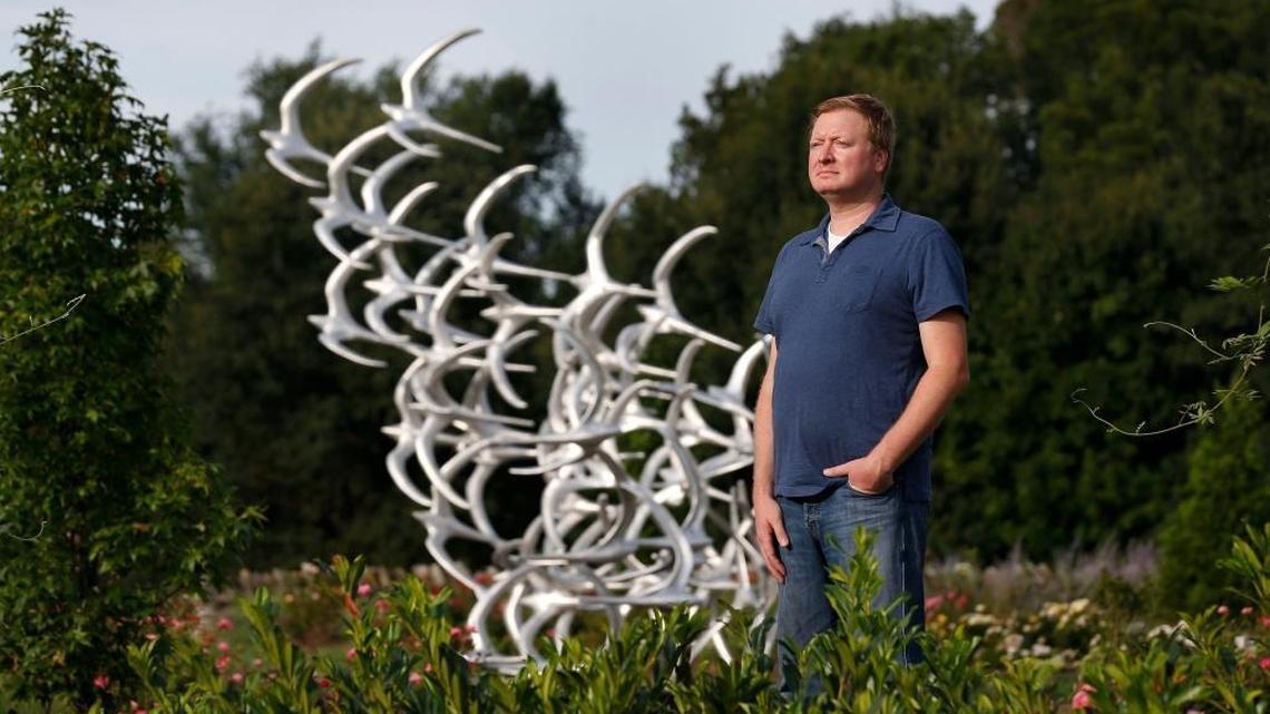 Matthew Snoddy, whose father, Tim Snoddy, died in the crash of Comair 5191, at the Comair 5191 Memorial in The Arboretum. A 10th-anniversary memorial service will be held Saturday honoring the 49 people who perished in the crash, which occurred at Blue Grass Airport on Aug. 27, 2006.