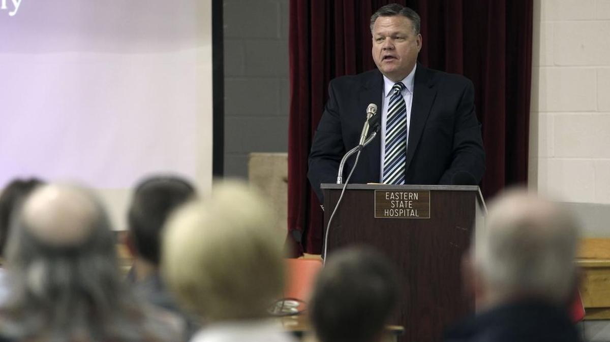 Fayette County Coroner Gary Ginn spoke during a re-interment ceremony for 178 individuals held in the gymnasium on the Old Eastern State Hospital campus at 4th Street and Newtown Pike in Lexington, Ky., Tuesday, May 14, 2013.