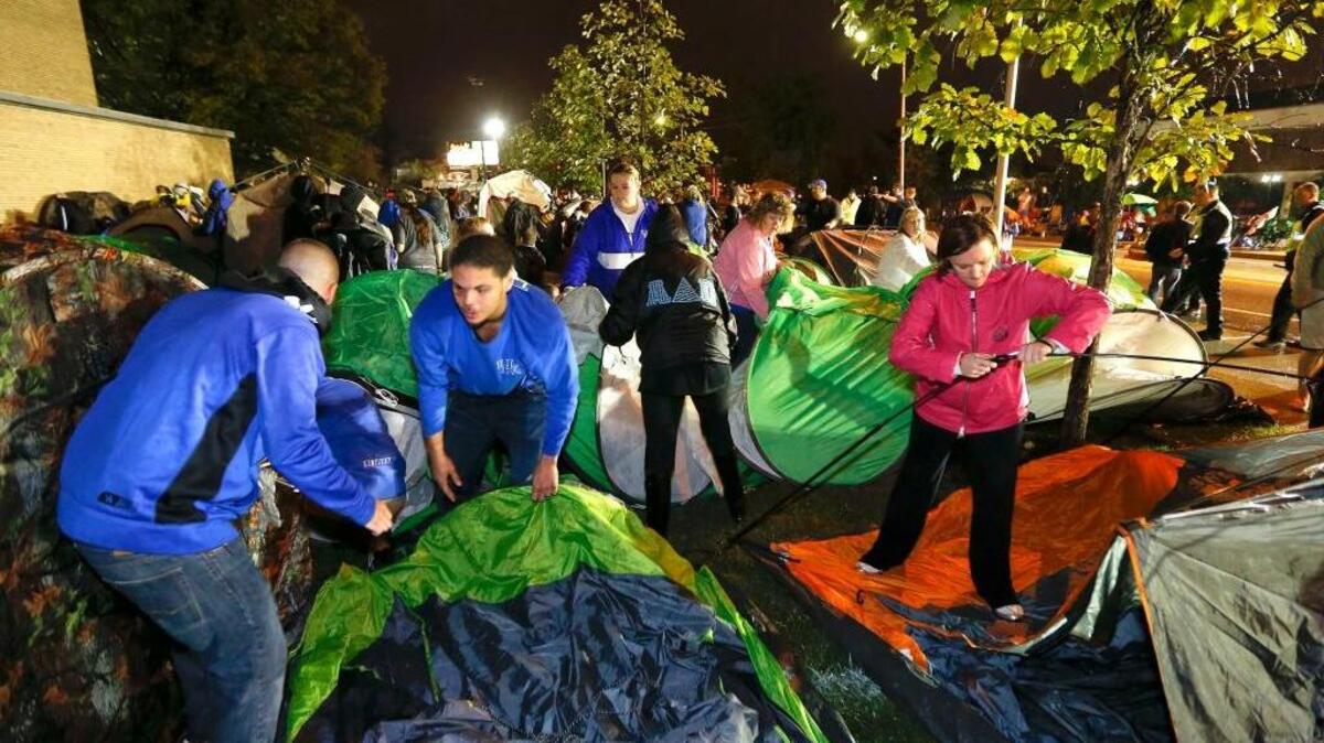 Campers rushed to set up their tents last year after the 5 a.m. start of UK’s annual Big Blue Madness campout outside Memorial Coliseum.