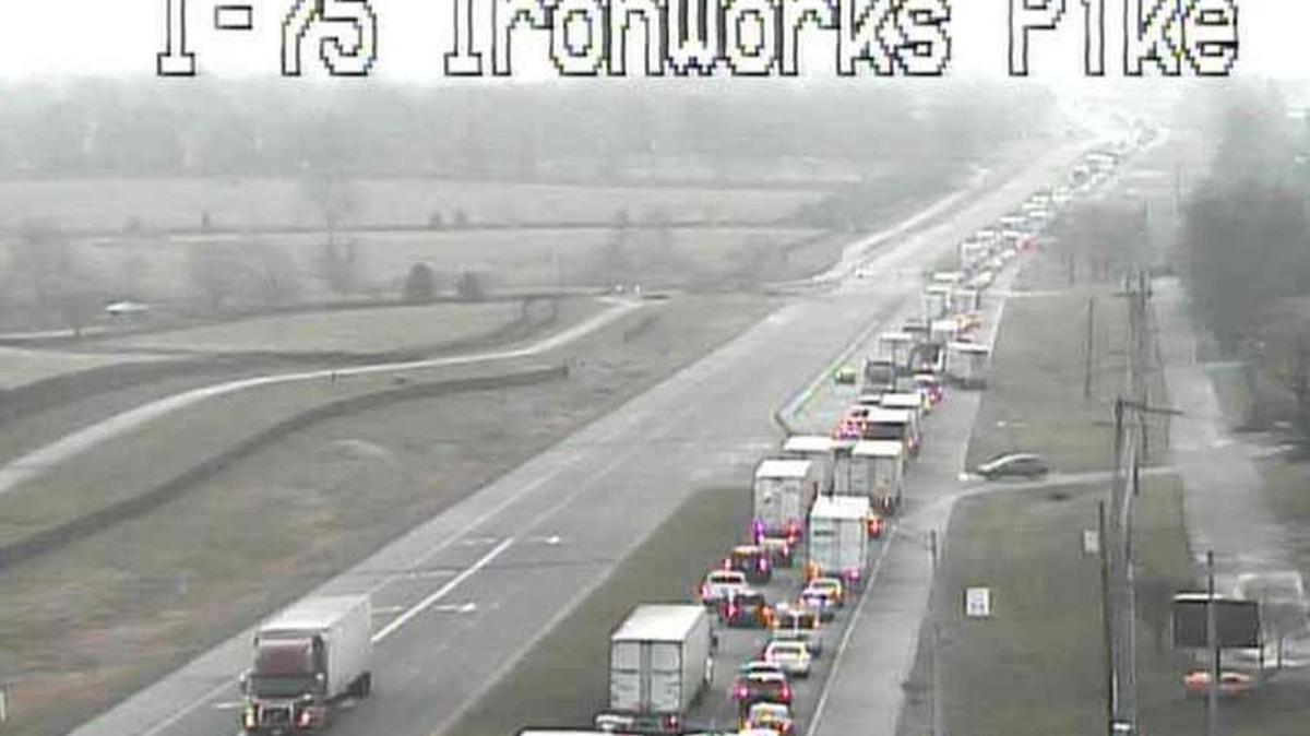 Traffic backed up Tuesday morning on Ironworks Pike as vehicles were detoured around fatal truck crashes on I-75.